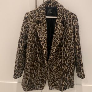 Leopard clairene like new! Fun piece!